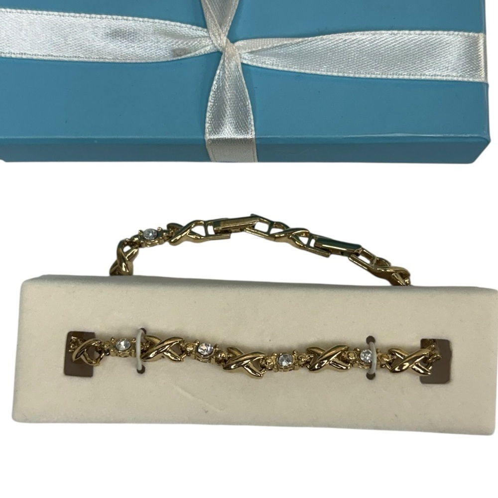 Avon Gold and Silver XOXOBracelet with Rhinestones